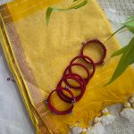 Vibrant Yellow Mul Mul Cotton Saree with Sequence Detailing.