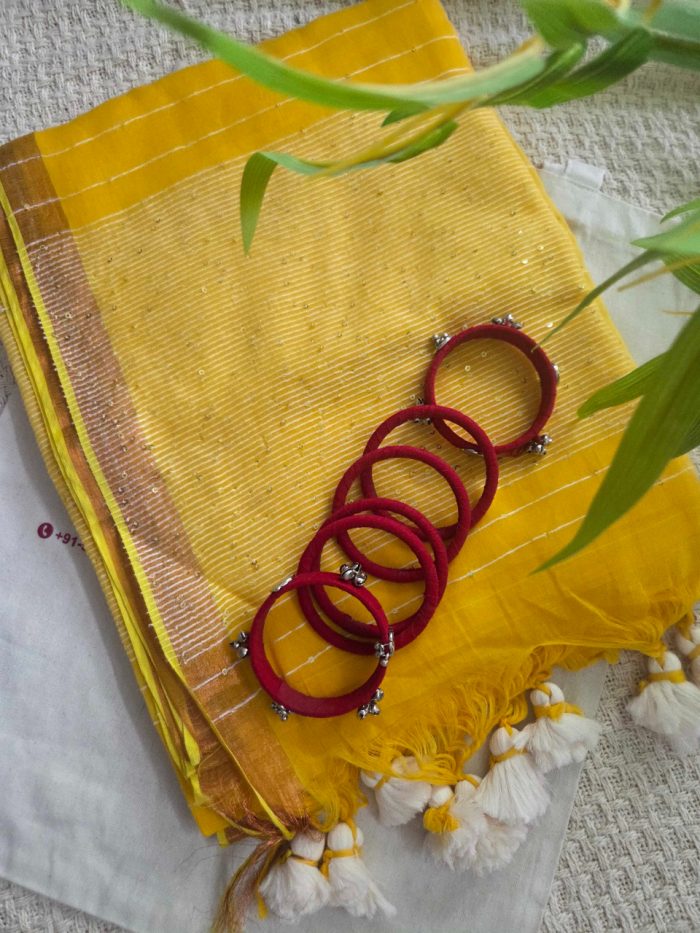 Vibrant Yellow Mul Mul Cotton Saree with Sequence Detailing.